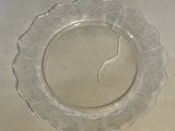 a glass plate with a crack in the middle of it