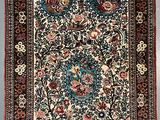 an antique persian rug with a floral design and fringe fringes