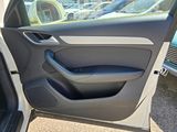 a car door with the door handle open and the door handle down