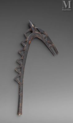 an image of a metal horse ' s head on a gray background