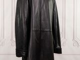 a black leather coat on a mannequin mannequin mannequin mannequin mannequin mannequin mannequin mannequin manne