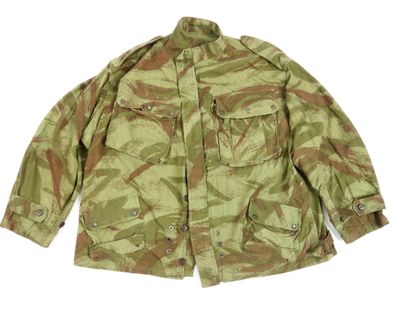 a close up of a military jacket on a white background