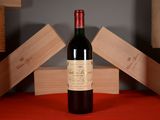 a bottle of wine that is sitting on a table
