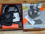a box with a pair of headphones in it on a table