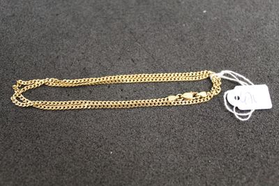 a close up of a gold chain with a tag on it