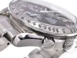 a close up of a watch on a white background