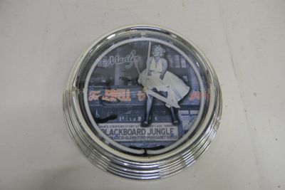 a picture of a clock with a picture of a baseball player on it