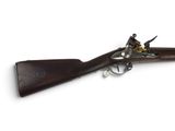 gros plan d'un fusil sur fond blanc