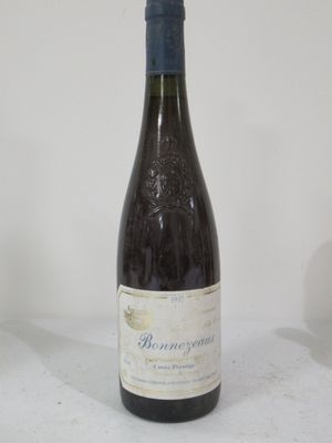 a bottle of wine that is sitting on a table