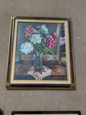 a painting of flowers in a vase on the wall
