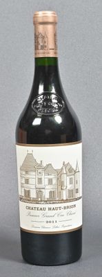 a bottle of wine that is sitting on a table