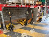 many tools that are sitting on the floor in the warehouse