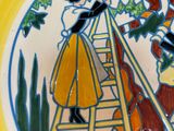 a yellow plate with a picture of a woman on a ladder