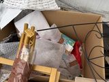 a box full of items that are sitting on the floor