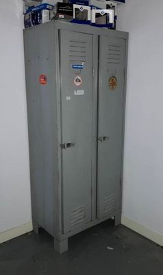 two lockers in the corner of a room