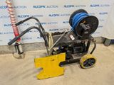 an image of a machine with a hose attached to it