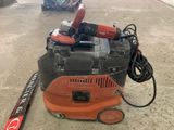 an image of a vacuum cleaner on the ground