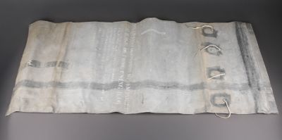 Sac étanche US. En toile caoutchouté noir.