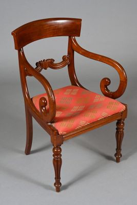 an image of a chair with a red seat and a wooden frame