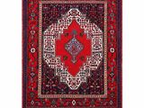 un tapis rouge et noir orné d'un médaillon
