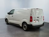 a picture of a white van parked in a room