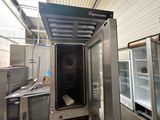 an image of a commercial kitchen with stainless steel appliances