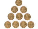 un groupe de six pièces d'or empilées les unes sur les autres