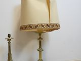 a lamp that is next to a lamp that is on a table