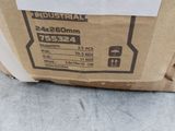 a cardboard box with a sign on it sitting on the ground