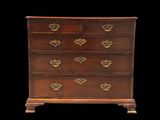 an image of a chest of drawers on a black background