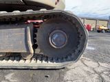 a close up of a tractor tire on the ground