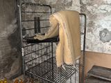 a metal rack with a towel on top of it
