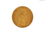 l'image d'une pièce d'or sur laquelle figure le visage d'une femme