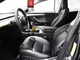 a picture of the inside of a car with leather seats
