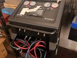 a machine that is sitting in a room with a lot of wires