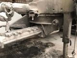 a close up of a machine that has a hose attached to the back of it