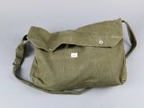 an image of a green bag with a tag on it