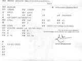 une image représentant une photo en noir et blanc d'un document comportant des caractères chinois