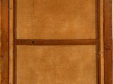 an old wooden box with a handle and two drawers