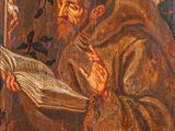 an old painting of a man reading a book in front of a skull