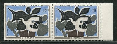 two stamps with a picture of a woman and a bird on them