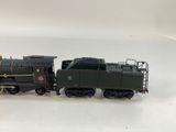 a toy train that is sitting on a white surface