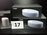 three boxes of different sizes and shapes of a smart device