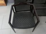 four chairs that are sitting in a room together