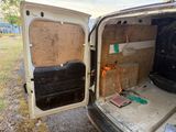 a white van with its door open and the back door open