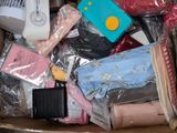 a cardboard box full of assorted items that are in it