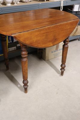 Table à volets XIXème en bois naturel.