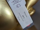 a gold figurine that has a price tag on it