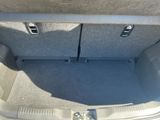 a trunk of a car that has two speakers in it