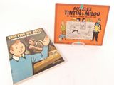 deux livres pour enfants sont posés l'un à côté de l'autre sur une table